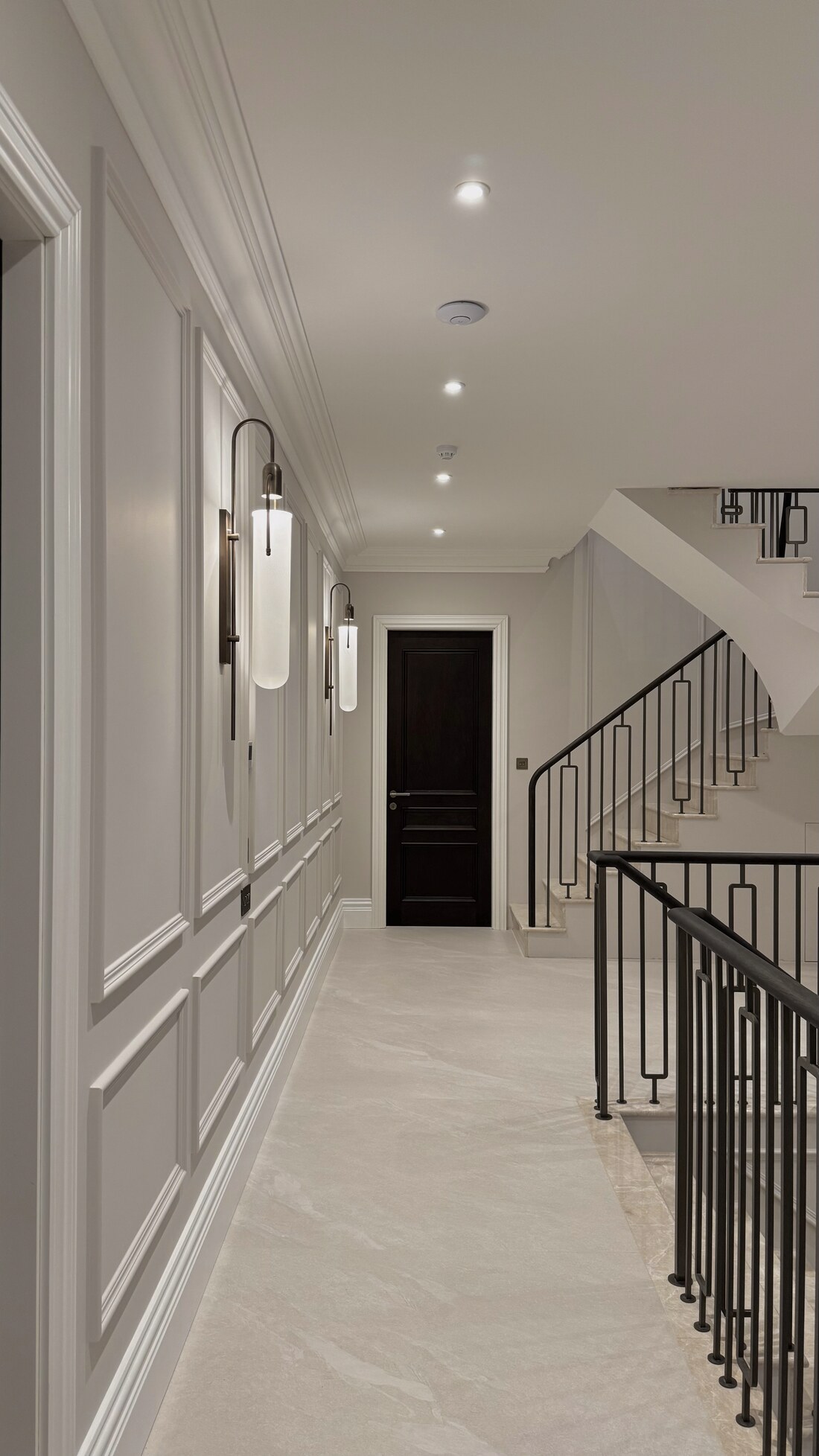Panelled hallway and staircase in a residential project