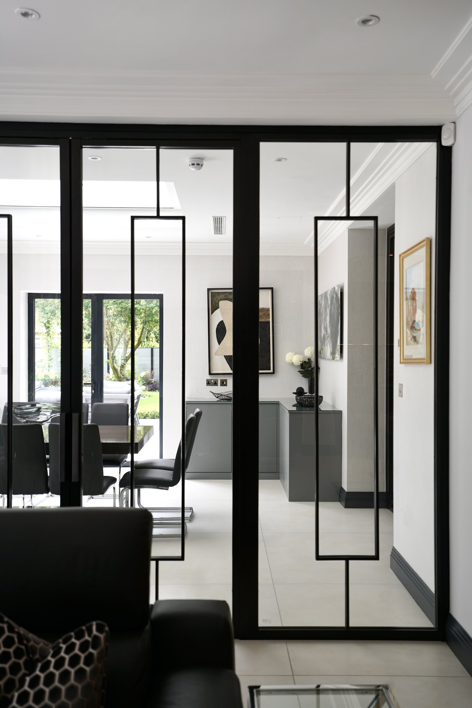 Black-framed glazed internal doors