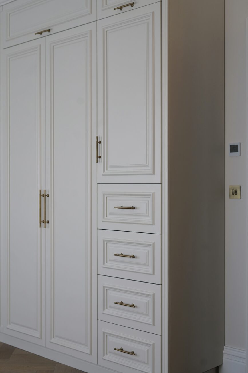 Brass-handled wardrobes